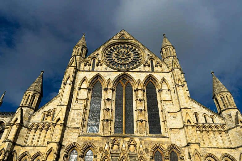 a large cathedral with a clock on the front of it, by Kev Walker, pexels contest winner, romanesque, yorkshire, square, panoramic, front lit