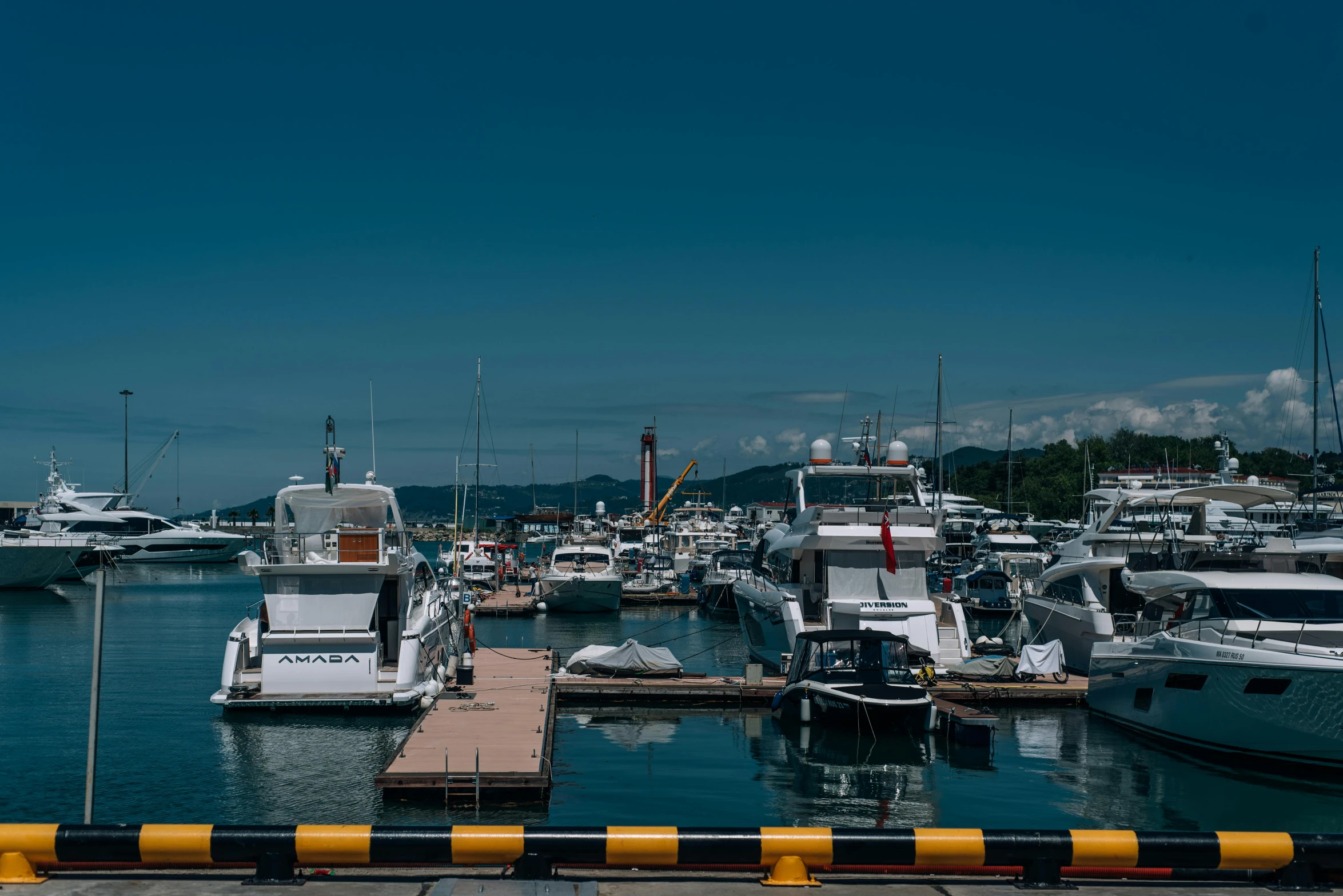 a marina filled with lots of white boats, a picture, pexels contest winner, mingei, in karuizawa, on a super yacht, high quality photo, thumbnail