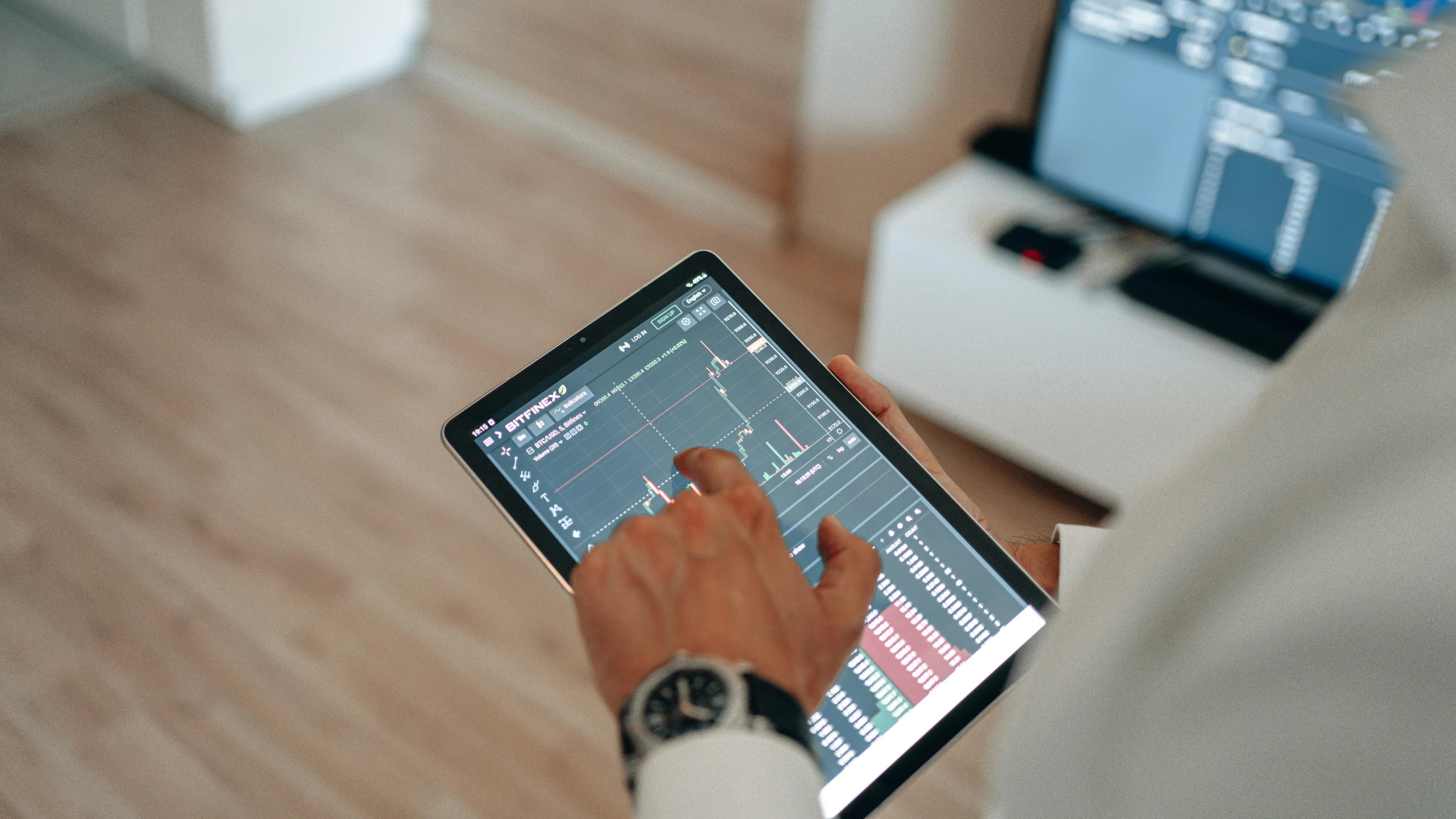 a close up of a person using a tablet, by Adam Marczyński, pexels, analytical art, waveforms on top of square chart, digital medical equipment, casually dressed, decoration