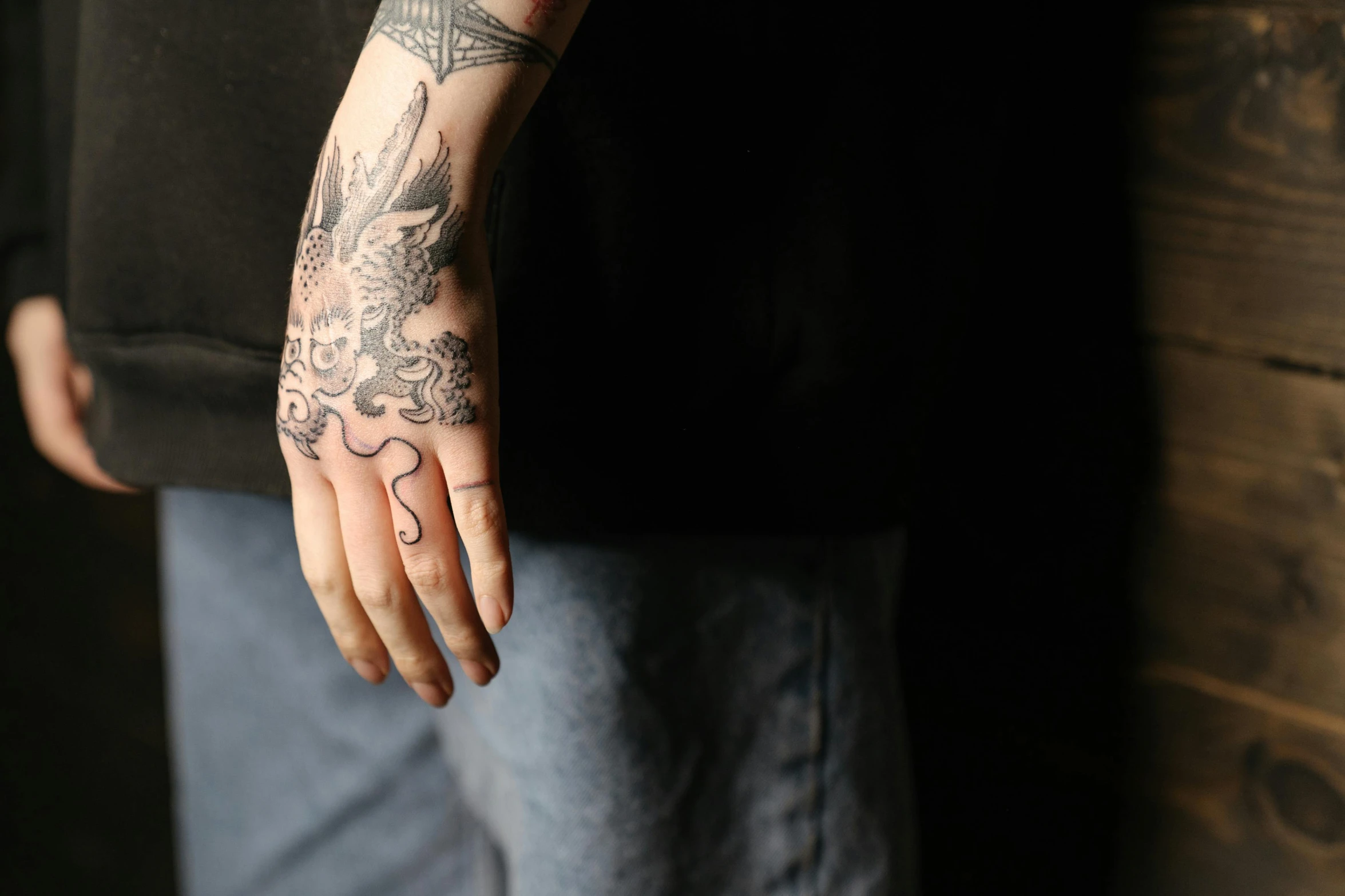 a man with a tattoo on his arm, a tattoo, by Tom Bonson, pexels, on his right hand, aaron horkey, lena oxton, aged 2 5