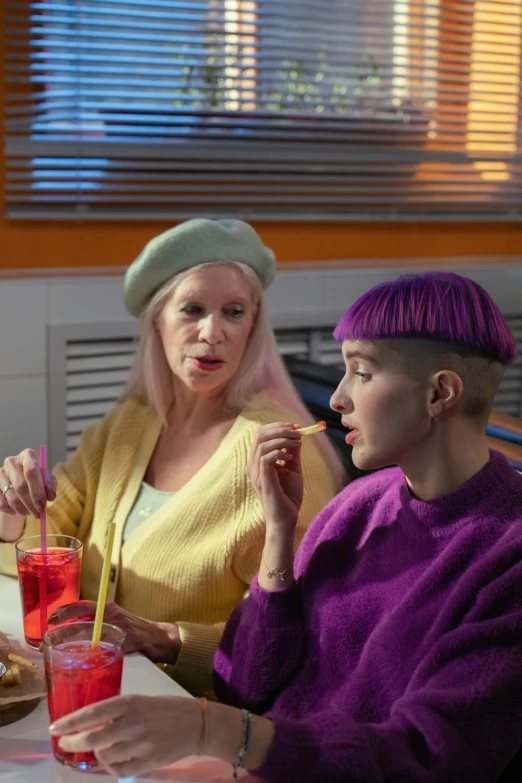 two women sitting at a table eating food, a portrait, inspired by Joanna Carrington, trending on pexels, she has purple hair, wearing a beret, movie still 8 k, albino hair