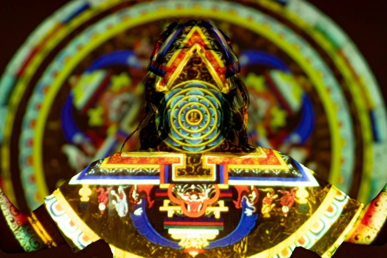 a close up of a statue of a person, an ultrafine detailed painting, by Jon Coffelt, cloisonnism, yantra, giant aztec spaceship, tibet, glowing ceremonial markings