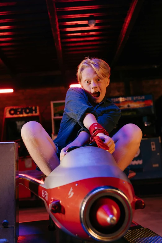 a woman sitting on top of a toy airplane, sophia lillis, bumper cars, he is screaming, filmstill