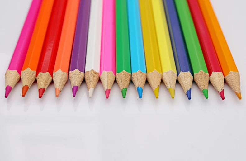 a group of colored pencils sitting next to each other, by Lorraine Fox, pexels, crayon art, instagram post, colorised, ilustration, very crisp details