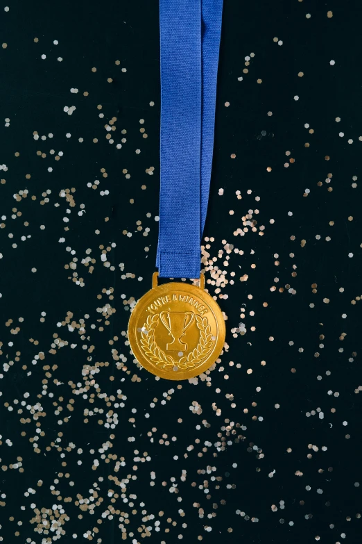 a gold medal sitting on top of a blue ribbon, space photography, 1980s photograph, nighttime, tall