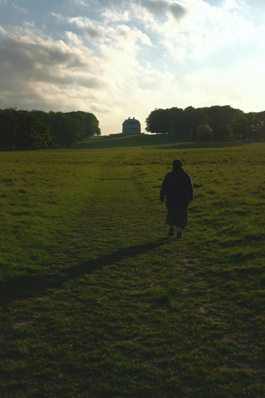 a person in a field flying a kite, an album cover, inspired by Henry Macbeth-Raeburn, happening, walking in a castle, ai weiwei and gregory crewdson, wide long view, london