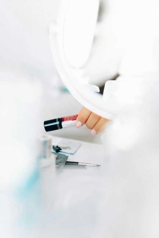 a woman brushing her teeth in front of a mirror, a picture, unsplash, happening, blood collection vials, white satin gloves, detailed color scan, sephora