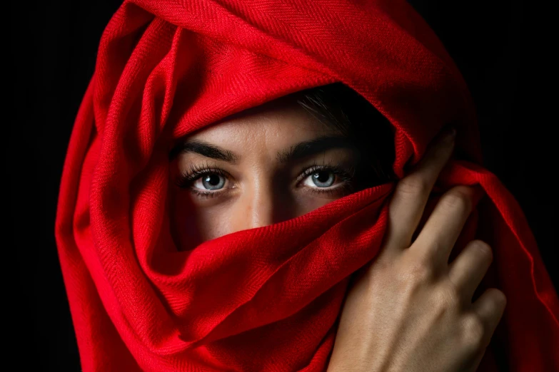 a woman with a red scarf covering her face, inspired by Steve McCurry, pexels contest winner, hyperrealism, sexy eyes, red fabric, portrait of bedouin d&d, fabric