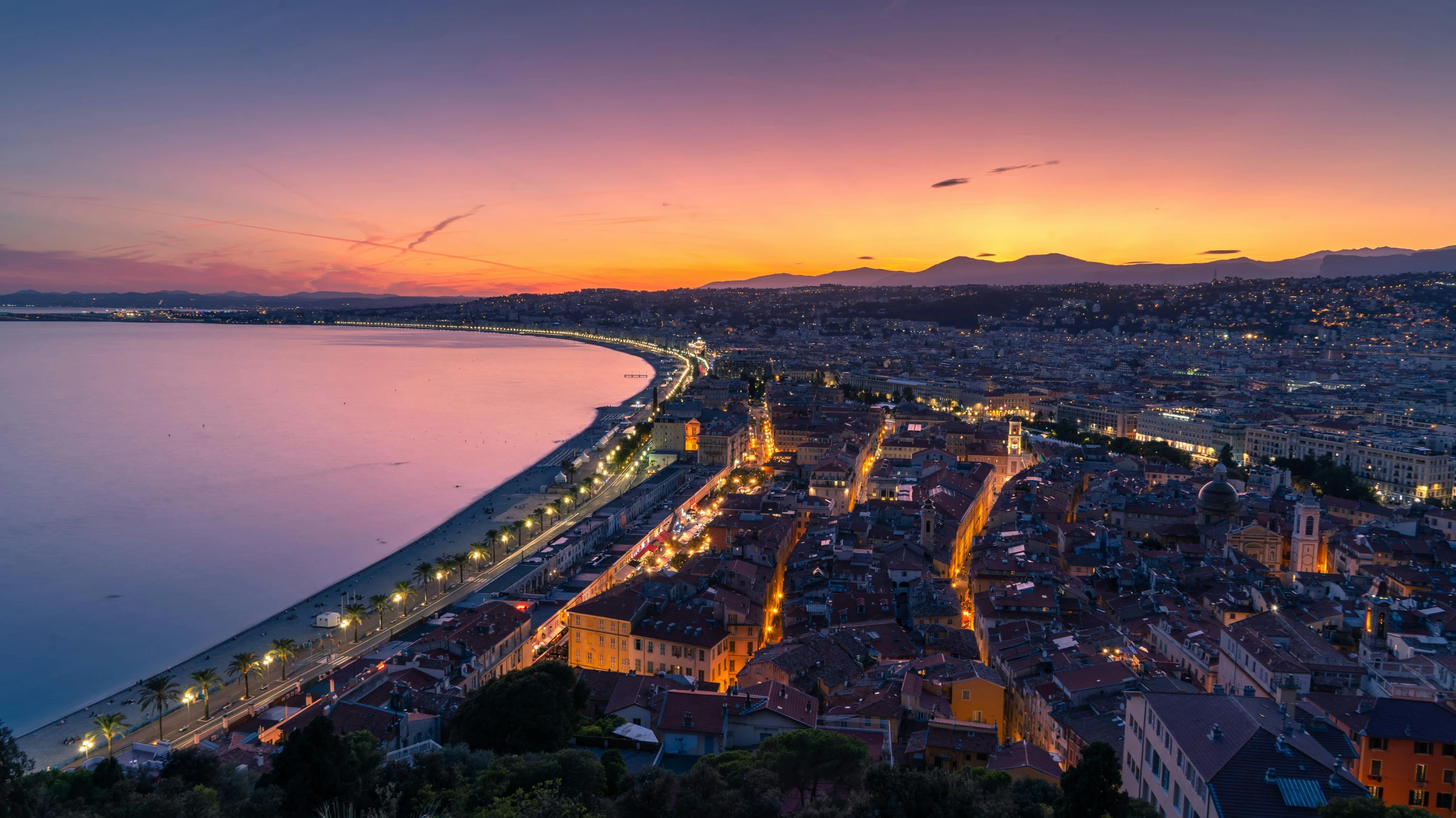 a view of a city from the top of a hill, by Bernard D’Andrea, pexels contest winner, renaissance, nice sunset, seaside, ultrawide lens”, paisley