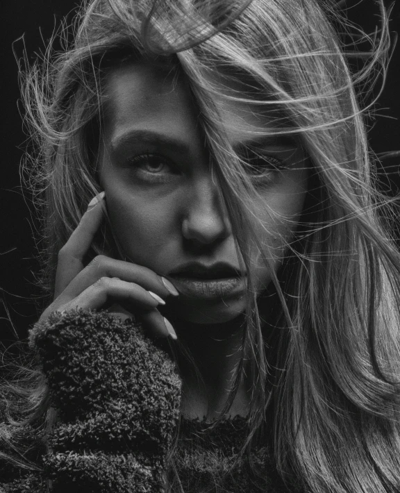 a black and white photo of a woman with long hair, trending on cgsociety, messy blond hair, cgsociety 4k”, thoughtful pose, fierce expression 4k