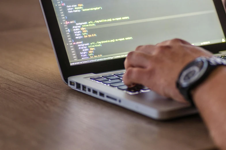 a close up of a person typing on a laptop, a computer rendering, unsplash, angular features, chris scalf, multiple stories, stockphoto