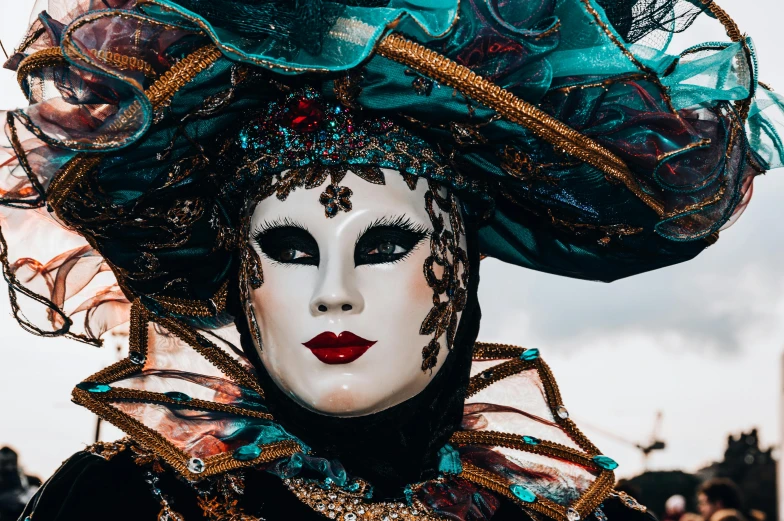 a close up of a person wearing a costume, inspired by Hedi Xandt, pexels contest winner, visual art, turquoise and venetian red, square, album art, carneval