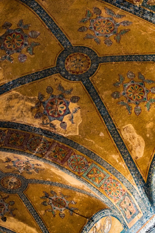 a close up of a ceiling with a clock on it, a mosaic, romanesque, with great domes and arches, ochre ancient palette, istanbul, taken in the early 2020s