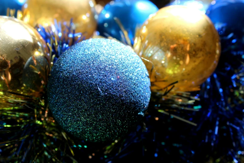 a close up of a bunch of blue and gold ornaments, a stipple, flickr, cinematic shot ar 9:16 -n 6 -g, tree's, colorful”, thumbnail