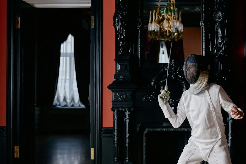 a man in a fencing suit holding a sword, inspired by Horace Vernet, unsplash contest winner, baroque, gothic mansion room, dezeen, playing, caroline foster