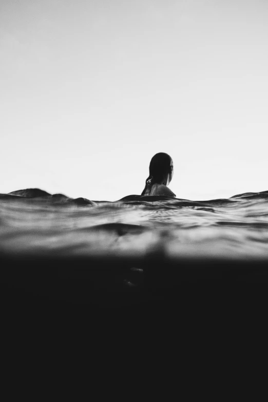 a black and white photo of a person in the water, slice of life, bottom of ocean, instagram photo, woman