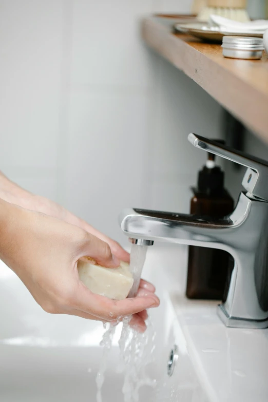 a person washing their hands under a faucet, by Nicolette Macnamara, square, soap, thumbnail, vanilla