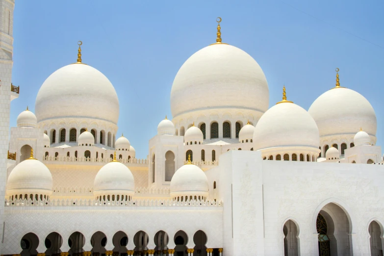 a group of people standing in front of a large white building, by Sheikh Hamdullah, pexels contest winner, arabesque, with great domes and arches, herzog de meuron, art deco buildings, youtube thumbnail