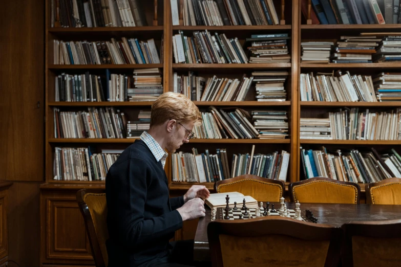 a man playing a game of chess in a library, a portrait, inspired by Simon Marmion, pexels contest winner, young handsome pale roma, sydney mortimer laurence, ignant, thumbnail