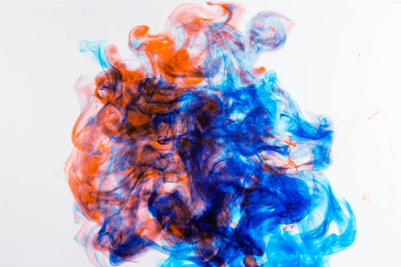 blue and orange ink in water on a white surface, an abstract drawing, by Adam Marczyński, pexels, fumes, videogame still, red blue, instagram post