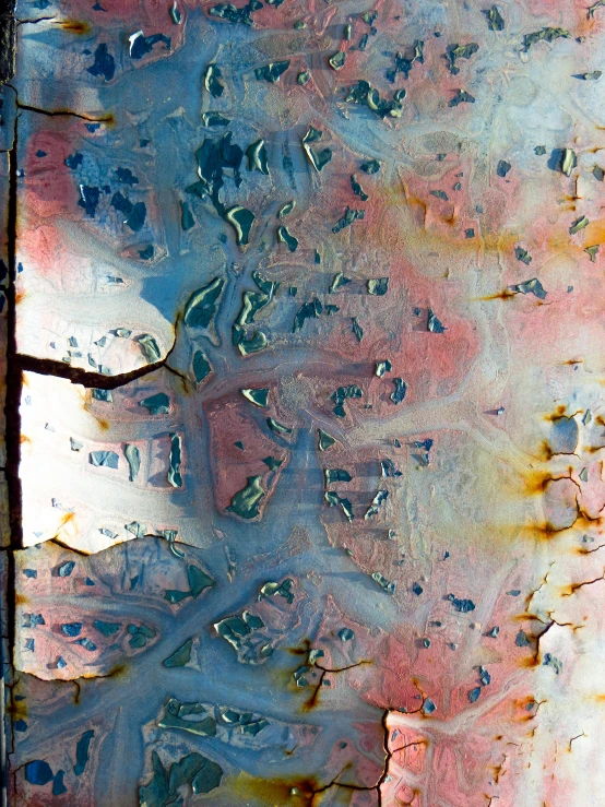 a close up of a rusted metal surface, an album cover, inspired by Richter, unsplash, lyrical abstraction, soft blue and pink tints, panel, taken in the late 2000s, enamel