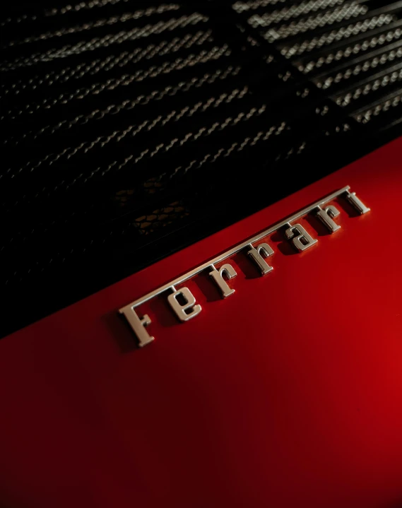 a close up of the emblem on a red car, inspired by Bernardo Cavallino, unsplash, 8k portrait render, sleek spines, studio product shot, medium format