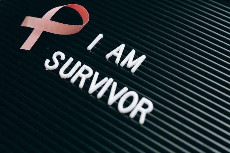 a sign that says i am survivor with a pink ribbon on it, background image, multiple stories, biological, slightly tanned