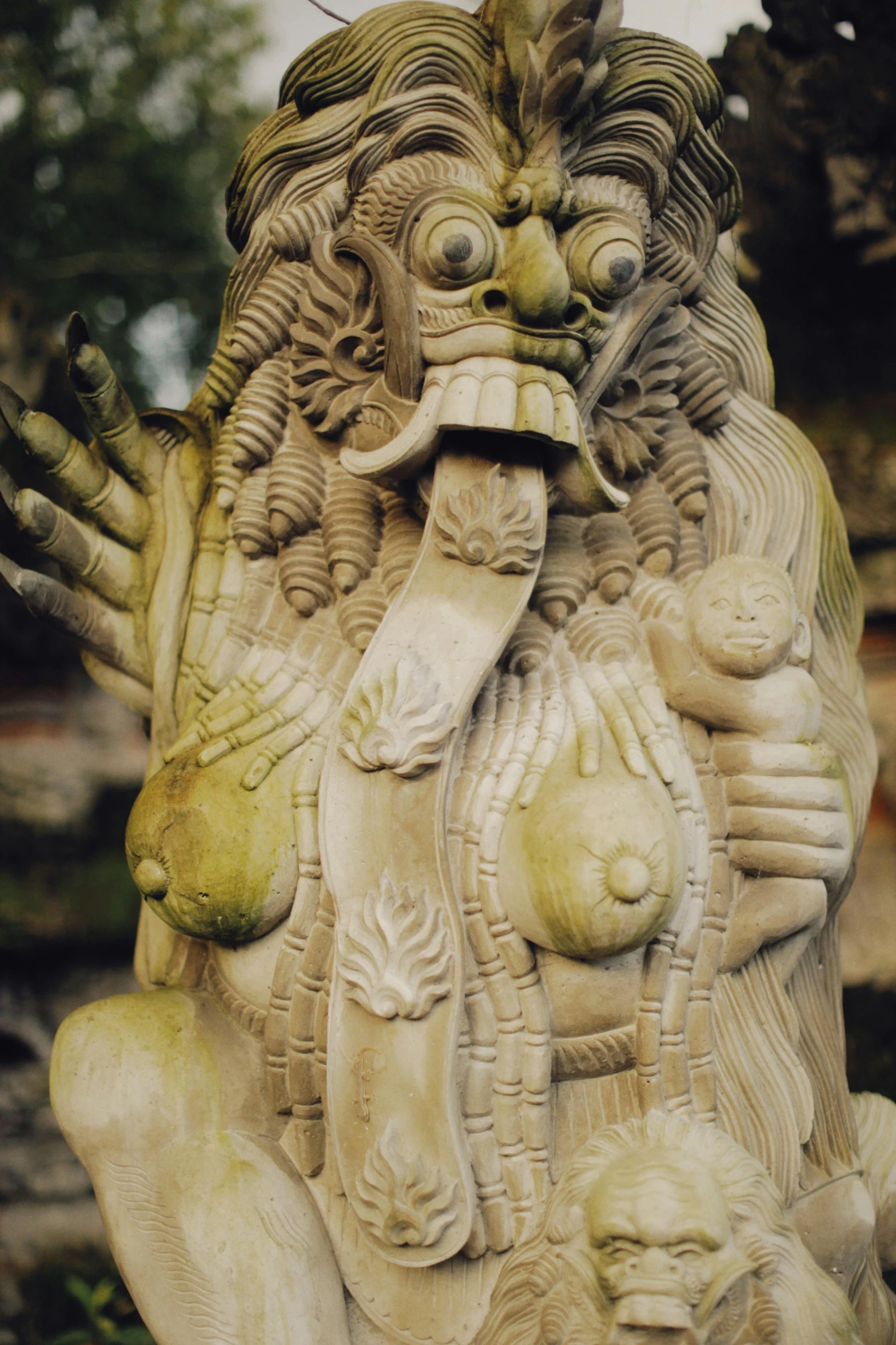 a close up of a statue of a lion, reddit, sumatraism, witch - doctor, taken in the late 2000s, upper torso, ganesha