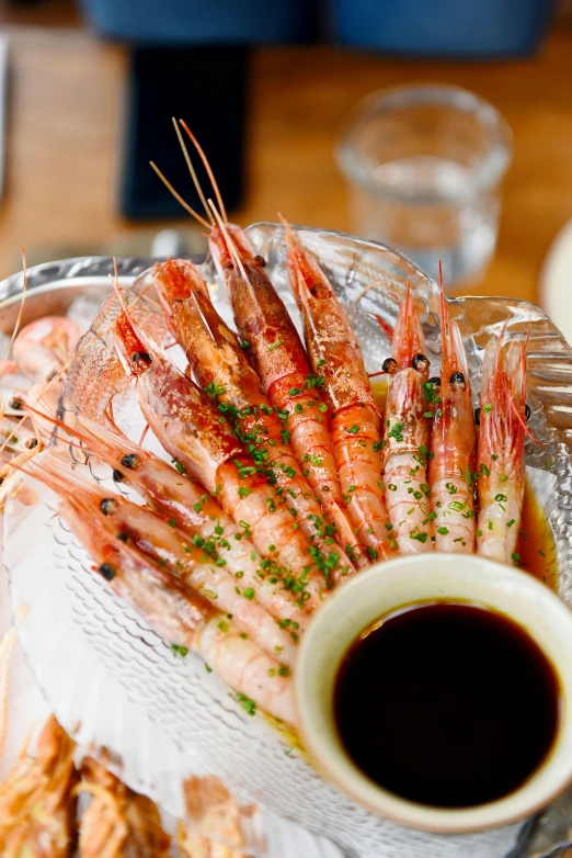 a close up of a plate of food on a table, by Jan Tengnagel, unsplash, shin hanga, prawn, heat shimmering, fully covered, krystal