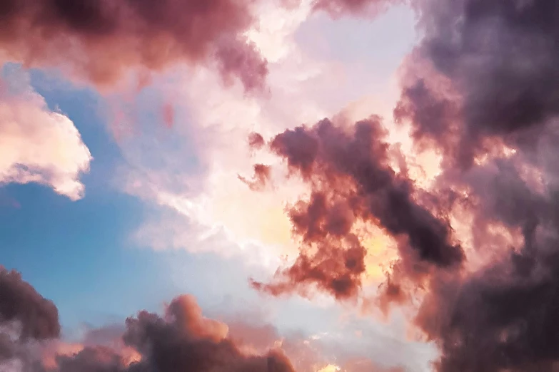 there is a plane that is flying in the sky, by Carey Morris, pexels contest winner, romanticism, mauve and cinnabar and cyan, dreamy puffy clouds, dramatic reddish light, major arcana sky