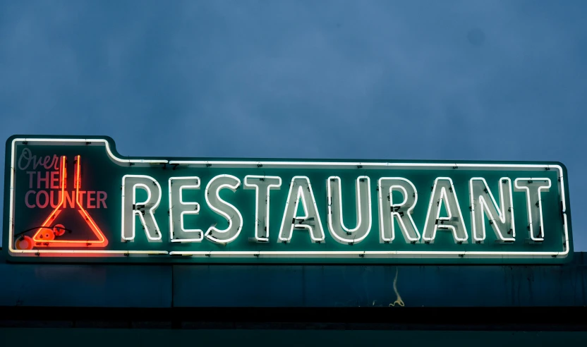 a neon restaurant sign on top of a building, by Carey Morris, unsplash, renaissance, family dinner, blue and green light, restaurant menu photo, 1970s photo