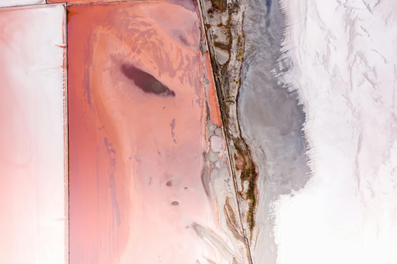 a man riding a snowboard down a snow covered slope, an ultrafine detailed painting, inspired by Julian Schnabel, trending on unsplash, metaphysical painting, reflections in copper, close-up from above, made of liquid metal and marble, helene frankenthaler