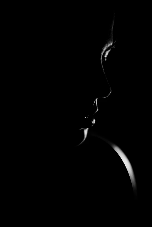 a black and white photo of a woman in the dark, by Zsolt Bodoni, art photography, high contrast!!, woman's profile, dawn cgsociety, pout