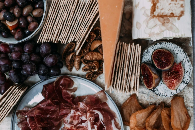 a close up of a plate of food on a table, by Daniel Lieske, pexels contest winner, cheese and salami on the table, 🦩🪐🐞👩🏻🦳, cornucopia, dry
