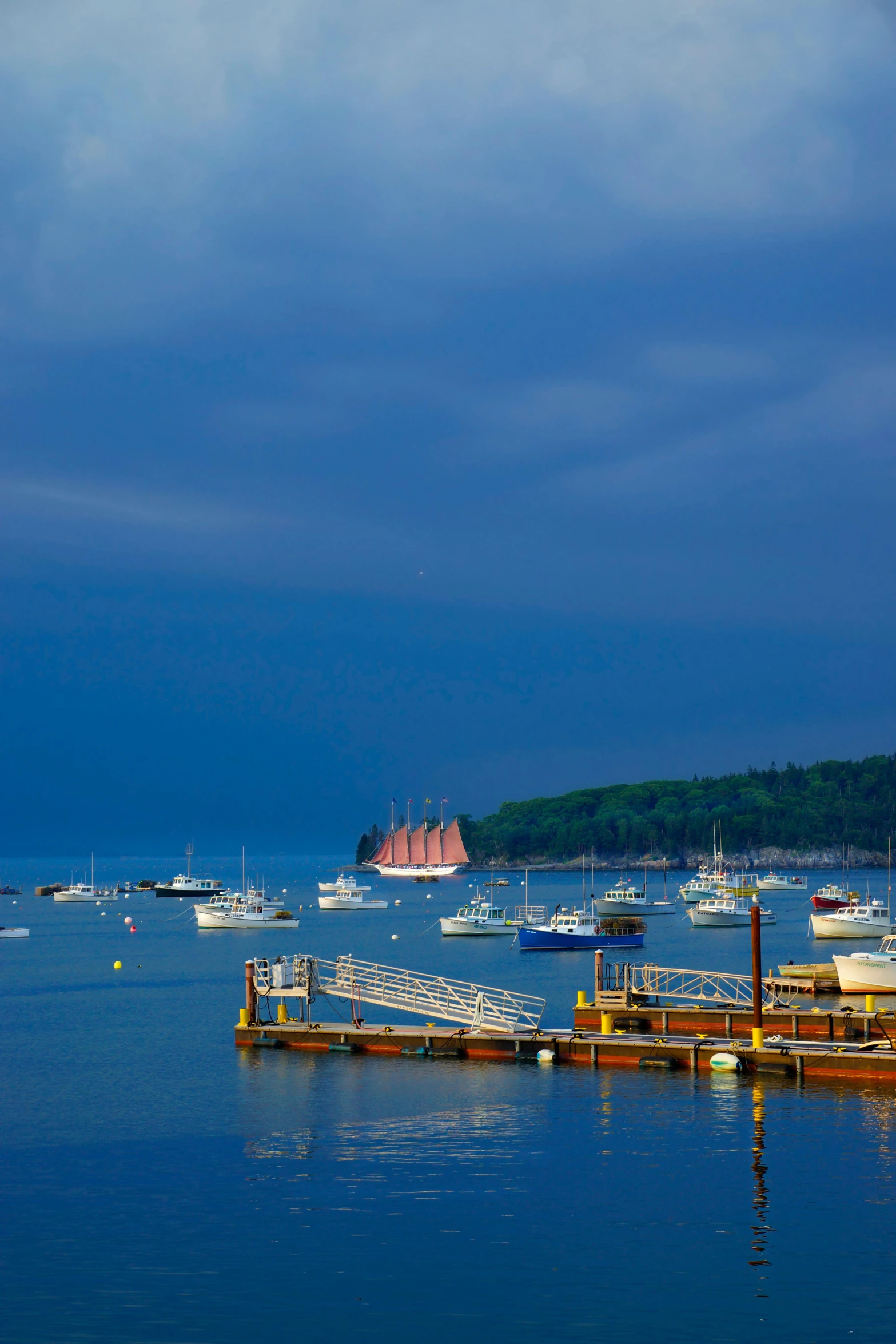 a harbor filled with lots of boats under a cloudy sky, by Dave Melvin, slide show, broadway, summer night, fan favorite