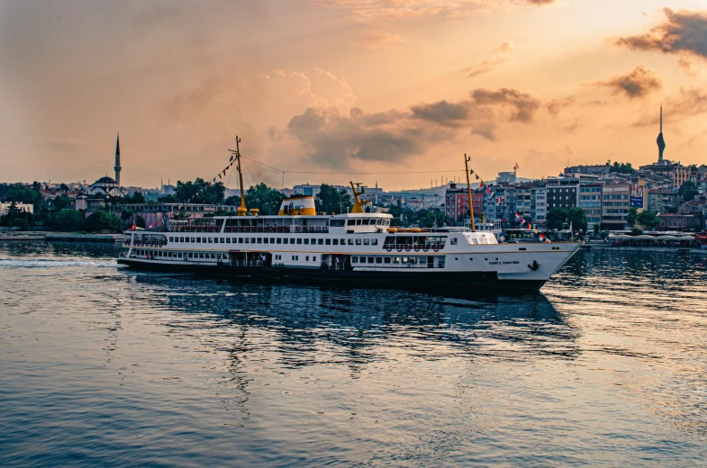 a large white boat floating on top of a body of water, pexels contest winner, hurufiyya, fallout style istanbul, 🚿🗝📝