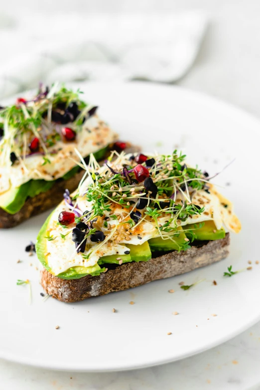 two slices of bread topped with avocado and sprouts, by Alexander Brook, profile image, scandinavian style, astri lohne, breakfast