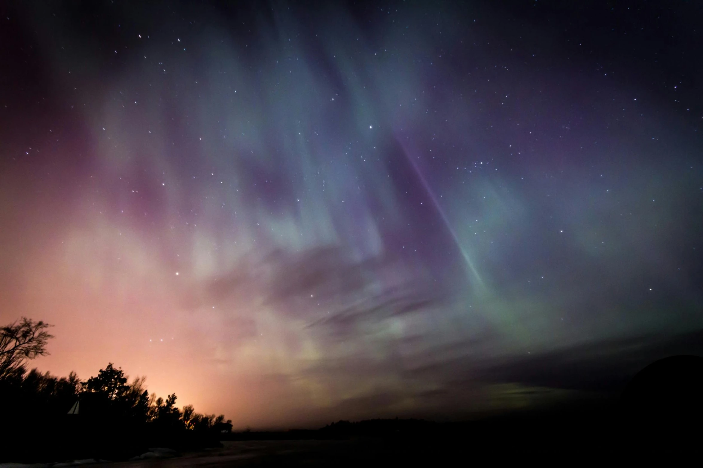 the aurora bore lights up the night sky, pexels contest winner, hurufiyya, blue and pink lighting, muted coloures, minn, post processed