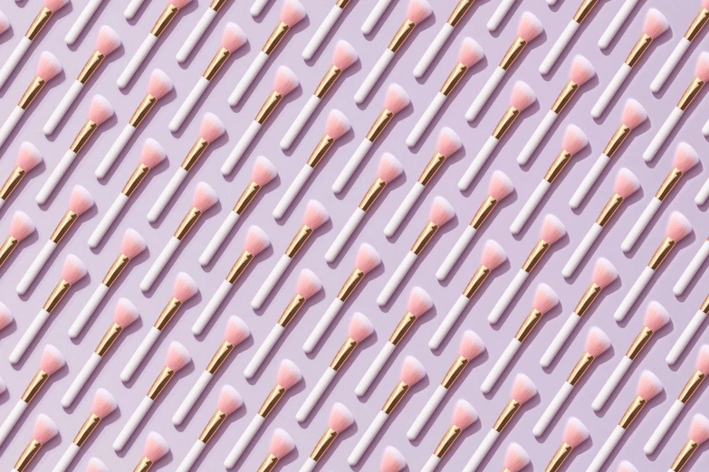a pattern of toothbrushes on a purple background, an airbrush painting, trending on pexels, light pink lipstick, bullets, pink and gold, fan favorite