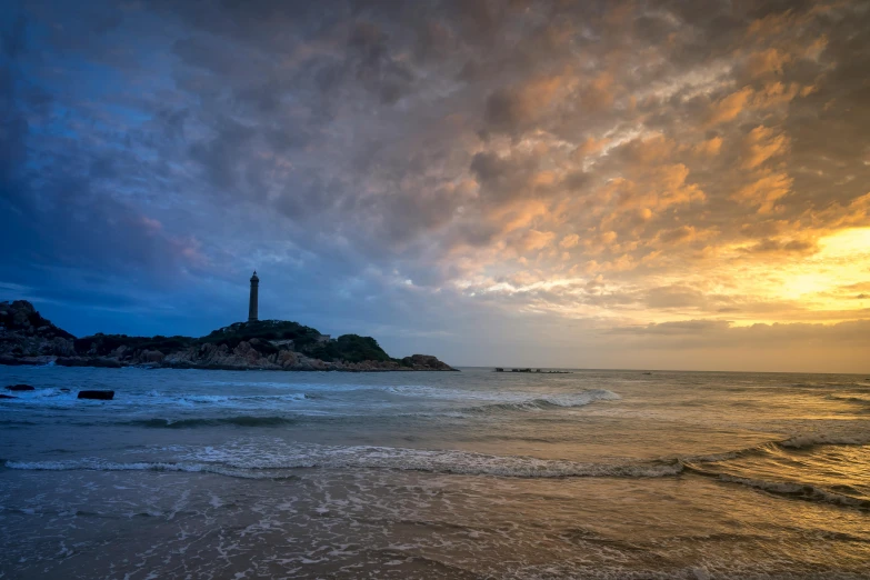 a lighthouse sitting on top of a sandy beach, by Peter Churcher, unsplash contest winner, last light, long chin, view, pastel sky