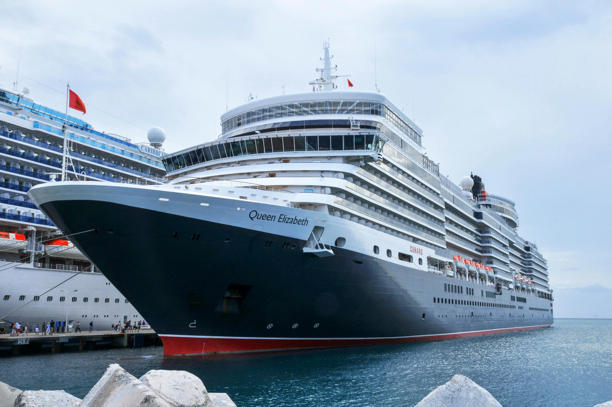 a large cruise ship in a body of water, a portrait, by Carey Morris, pexels contest winner, renaissance, black crown, 2 5 6 x 2 5 6 pixels, queen elizabeth, high quality picture