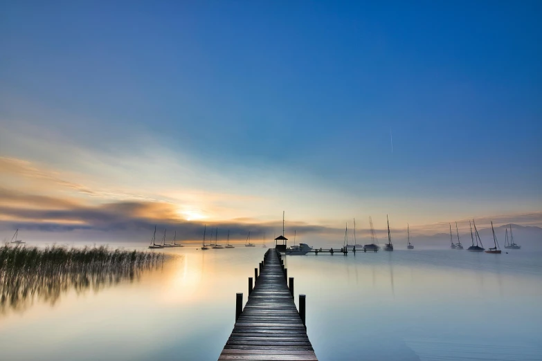 a dock in the middle of a body of water, by Holger Roed, landscape wallpaper, at gentle dawn blue light, fine art print, hd nature photography