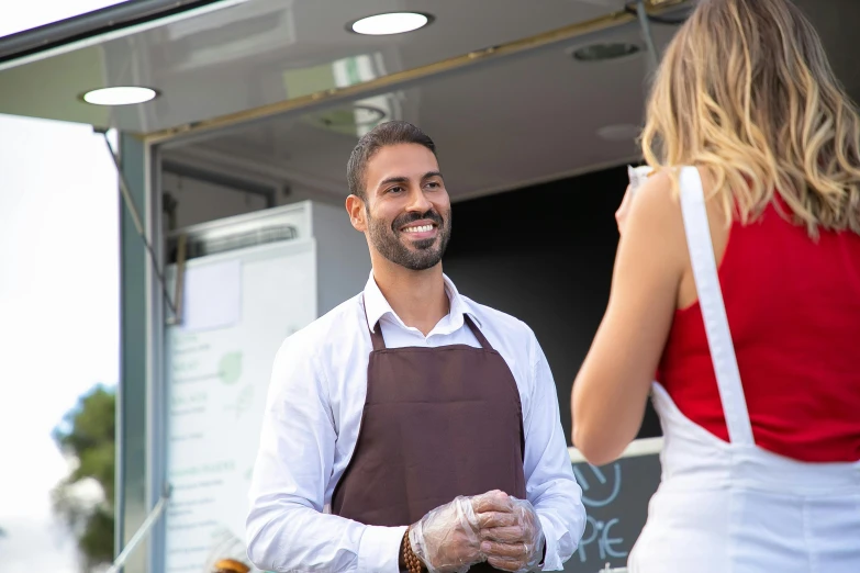 a man and woman standing in front of a food truck, pexels contest winner, renaissance, handsome man, aussie baristas, background : diego fazio, serving suggestion