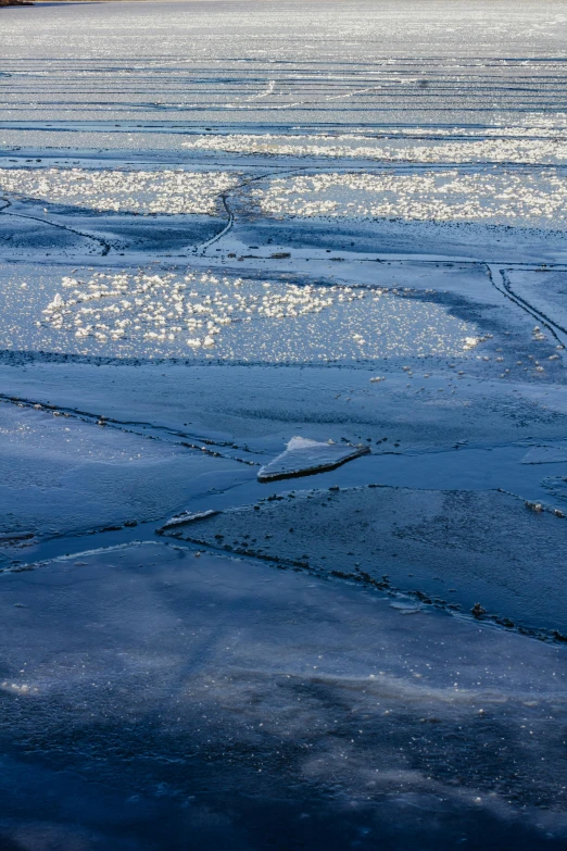 a large body of water covered in ice, inspired by Jan Rustem, trending on unsplash, land art, 8k resolution”, runway photo, dramatic ”