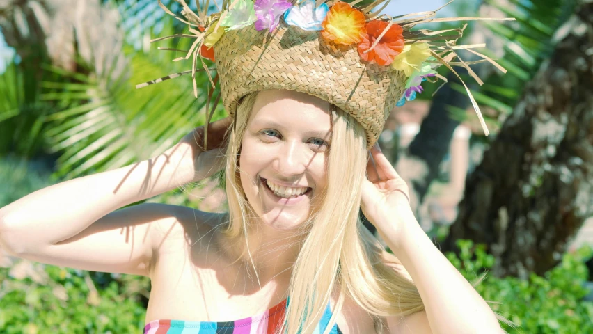 a woman wearing a straw hat on top of her head, inspired by Maties Palau Ferré, happening, avatar image, blonde, flower crown, bright smile