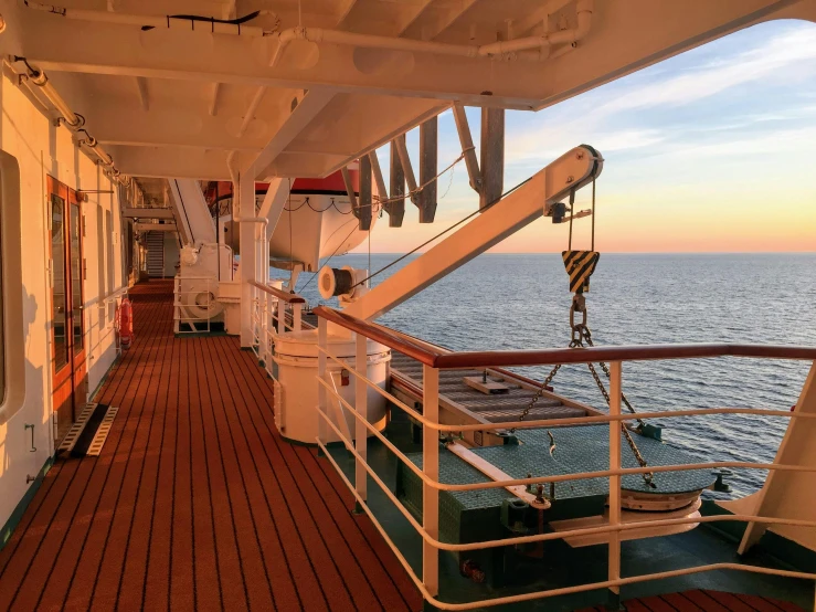 a view of the ocean from the deck of a cruise ship, renaissance, picard on a starboard, warmly lit, maintenance, reddit post