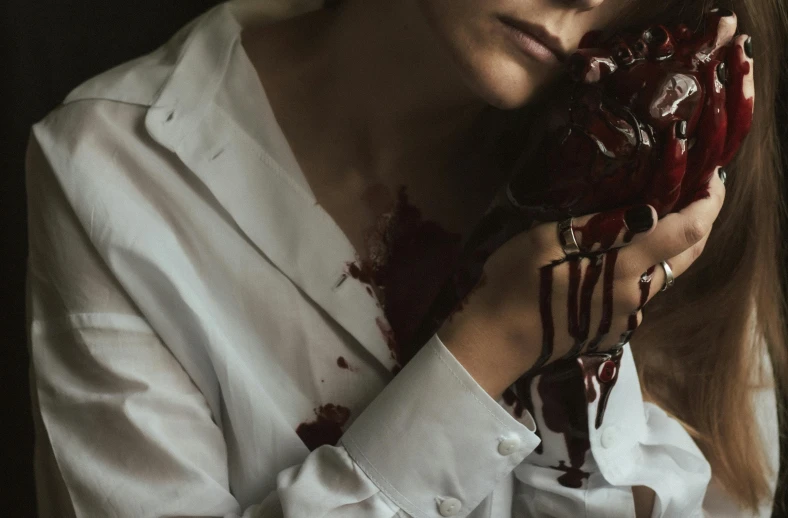 a woman holding a donut covered in blood, inspired by Elsa Bleda, trending on pexels, hyperrealism, wearing lab coat and a blouse, caravaggio style, dreaming bodies, holding a sacrificial dagger