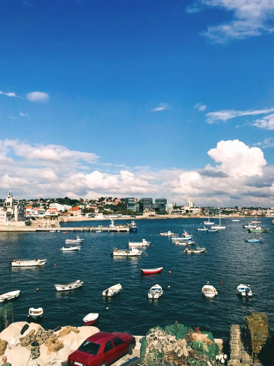 a large body of water filled with lots of boats, pexels contest winner, portugal, 💋 💄 👠 👗, bright summer day, thumbnail