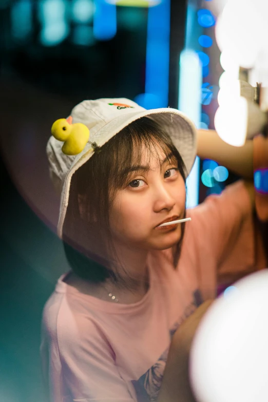 a woman brushing her teeth in front of a mirror, inspired by Nara Yoshitomo, pexels contest winner, hyperrealism, wearing a cute hat, pacman, japanese akihabara cafe, avatar image