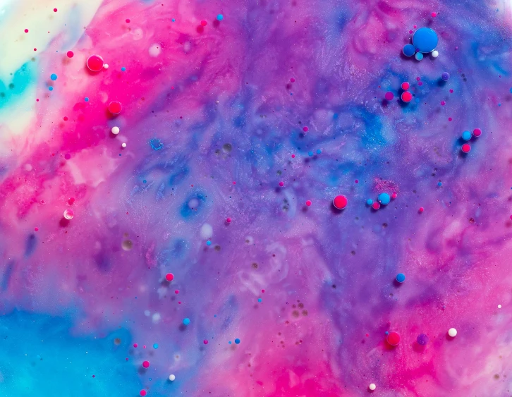 a close up of a colorful liquid painting, trending on pexels, fuchsia and blue, candy - coated, galaxy, stained paper